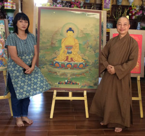 Venerable Thich Thanh Huan and DVA interpreter Son Pham at the Pháp Vân Pagoda Exhibit of Indian Buddhist art.